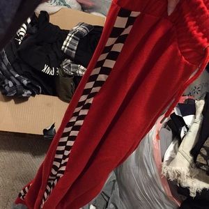 red pants with checkered stripe